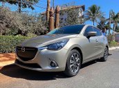 Cần bán Mazda 2 2016, màu vàng, 450tr