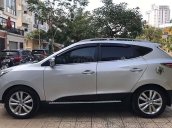 Cần bán Hyundai Tucson 2.0 AT 4WD đời 2011, màu bạc, nhập khẩu