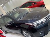 Cần bán xe Toyota Corolla Altis 1.8G AT năm sản xuất 2015, màu đen số tự động