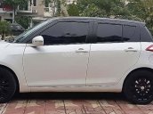 Cần bán xe Suzuki Swift đời 2015, màu trắng