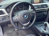 Bán xe BMW 320i màu đỏ/kem model 2016 cũ giá tốt - trả trước 400 triệu nhận xe ngay