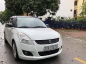 Cần bán gấp Suzuki Swift sản xuất năm 2014, màu trắng