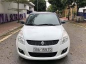 Cần bán gấp Suzuki Swift sản xuất năm 2014, màu trắng