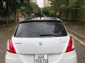 Cần bán gấp Suzuki Swift sản xuất năm 2014, màu trắng