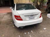 Cần bán xe Mercedes C300 AMG đời 2011, màu trắng, xe nhập, giá 654tr