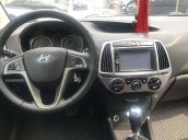 Cần bán Hyundai i20 1.4 AT đời 2013, màu trắng, nhập khẩu xe gia đình