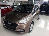 Hyundai Grand i10 1.2 MT vàng cát giao ngay, hỗ trợ đăng ký Grab, hỗ trợ vay trả góp lãi suất ưu đãi. LH: 0977 139 312