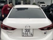 Cần bán xe Mazda 3 đời 2015, màu trắng giá cạnh tranh