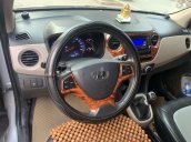 Cần bán xe Hyundai Grand i10 đời 2015, màu bạc, nhập khẩu nguyên chiếc, 309tr