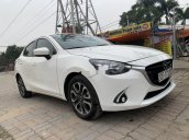 Cần bán gấp Mazda 2 2016, màu trắng còn mới, 450tr