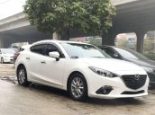 Cần bán gấp Mazda 3 AT sản xuất 2015, màu trắng 