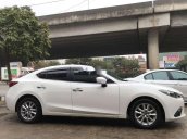 Cần bán gấp Mazda 3 AT sản xuất 2015, màu trắng 