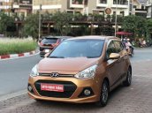 Bán xe Hyundai Grand i10 AT sản xuất năm 2014 chính chủ