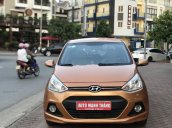 Bán xe Hyundai Grand i10 AT sản xuất năm 2014 chính chủ