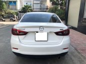 Cần bán lại xe Mazda 2 đời 2016, màu trắng số tự động