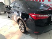 Cần bán lại xe Toyota Corolla Altis 2015, màu đen