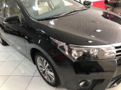 Cần bán lại xe Toyota Corolla Altis 2015, màu đen