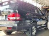 Bán Ssangyong Musso đời 2004, màu đen, nhập khẩu, 7 chỗ