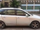 Bán Kia Carens 2.0 MT 2010, màu bạc