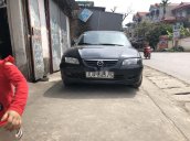 Cần bán Mazda 626 đời 2002, màu đen