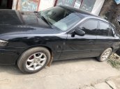 Cần bán Mazda 626 đời 2002, màu đen