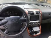 Cần bán xe Kia Carnival GS MT năm sản xuất 2005, màu đen, xe nhập số sàn