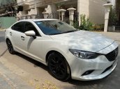 Cần bán xe Mazda 6 sản xuất 2014, màu trắng, 600 triệu