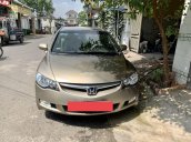 Bán Honda Civic 1.8AT sản xuất năm 2009, màu vàng, nhập khẩu nguyên chiếc xe gia đình, 310tr