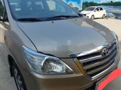 Bán Toyota Innova đời 2014, màu vàng nâu