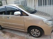 Bán Toyota Innova đời 2014, màu vàng nâu