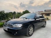 Cần bán gấp Kia Spectra đời 2003, màu đen, giá chỉ 99 triệu