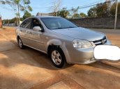 Cần bán xe Daewoo Lacetti MT sản xuất năm 2010, màu bạc xe gia đình