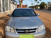 Cần bán xe Daewoo Lacetti MT sản xuất năm 2010, màu bạc xe gia đình