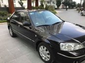 Bán Ford Laser năm sản xuất 2006, màu đen xe gia đình, 215tr