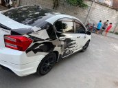 Cần bán lại xe Honda City AT sản xuất năm 2013, màu trắng