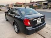 Xe Daewoo Lacetti sản xuất năm 2005, màu đen, xe nhập