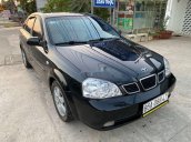 Xe Daewoo Lacetti sản xuất năm 2005, màu đen, xe nhập