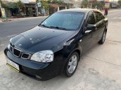 Xe Daewoo Lacetti sản xuất năm 2005, màu đen, xe nhập