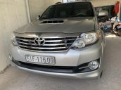 Fortuner G đời 2015 máy dầu, xe màu bạc, số tay, xe còn rất đẹp đi 82000km tên tư nhân ngay chủ, giá bán 700 triệu