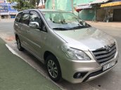 Bán Toyota Innova đời 2015, màu ghi vàng, số sàn