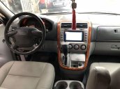 Bán xe Kia Carnival GS AT sản xuất 2009, màu vàng chính chủ