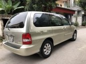 Bán xe Kia Carnival GS AT sản xuất 2009, màu vàng chính chủ