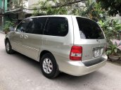 Bán xe Kia Carnival GS AT sản xuất 2009, màu vàng chính chủ