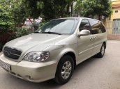 Bán xe Kia Carnival GS AT sản xuất 2009, màu vàng chính chủ