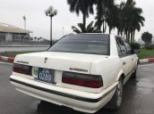 Cần bán xe Nissan Bluebird đời 1996, màu trắng, xe biển xanh