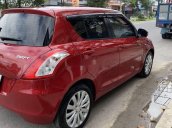 Cần bán gấp Suzuki Swift 1.4 sản xuất 2017, màu đỏ chính chủ, giá tốt