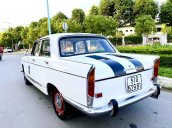 Cần bán lại xe Peugeot 404 sản xuất 1965, màu trắng, full option