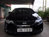 Cần bán lại xe Kia Forte đời 2010, màu đen, xe nhập xe gia đình