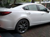 Chính chủ bán xe Mazda 6 2.0 Primium 2017, đã chạy 30.000 km, xe trang bị gồm màn hình DVD, cảm biến lùi, cảnh báo điểm