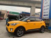 Bán xe Hyundai Creta đăng ký 2015, màu vàng mới 95% giá chỉ 585 triệu đồng